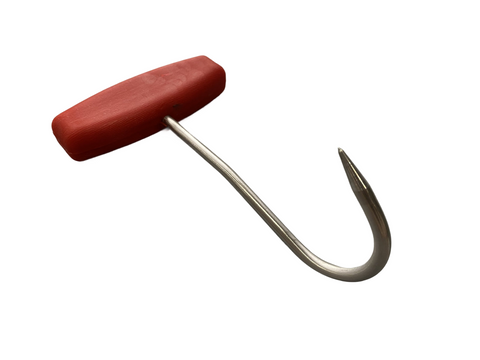 A red plastic handle with a silver hook attached to it.