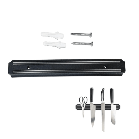 a set of knives and a pair of scissors on a black background