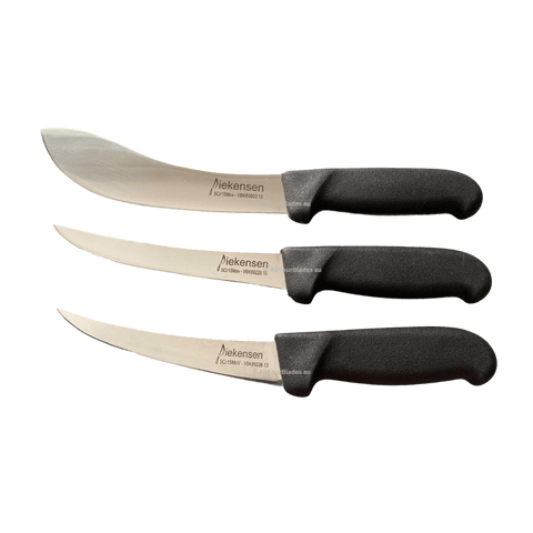 a pair of knives sitting next to each other