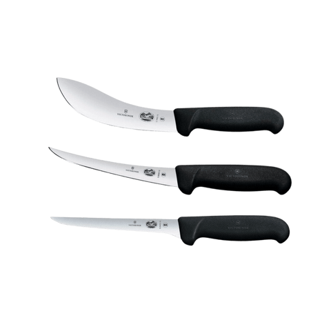 three knives with black handles on a black background