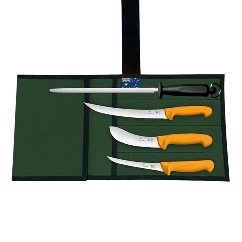 a knife set with four knives in a case