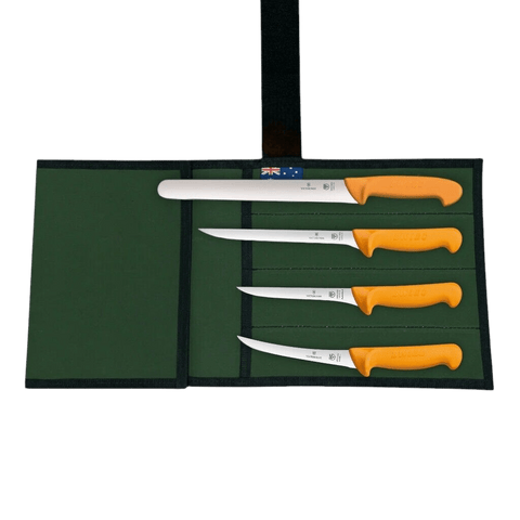 a set of four knives in a case