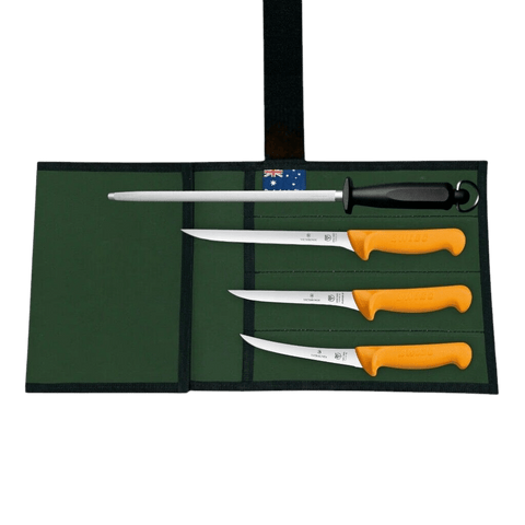a set of four knives in a case